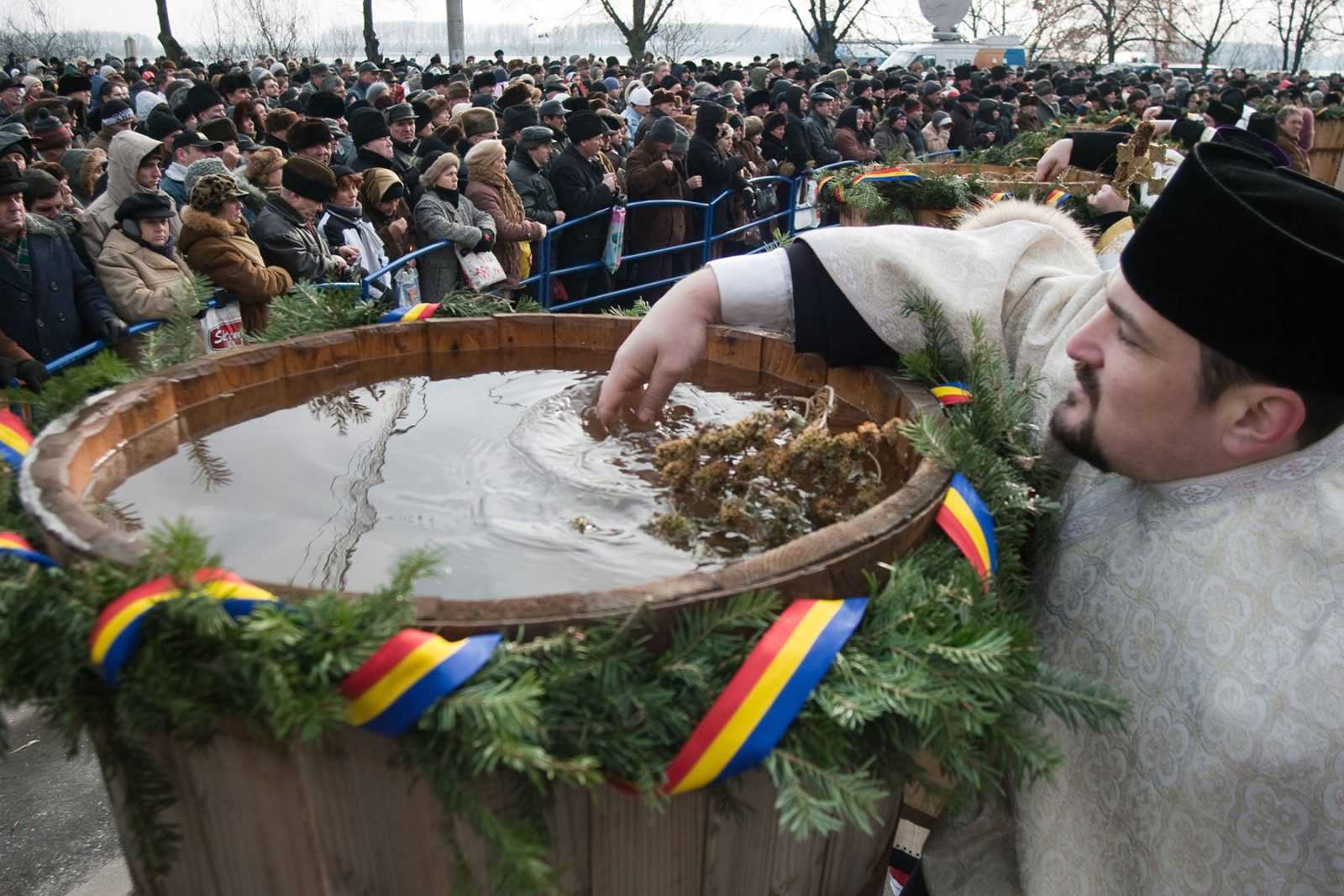 A priest sanctifies the water in Epiphany ceremony that took place in Galați, Romania on January 6th, 2009.