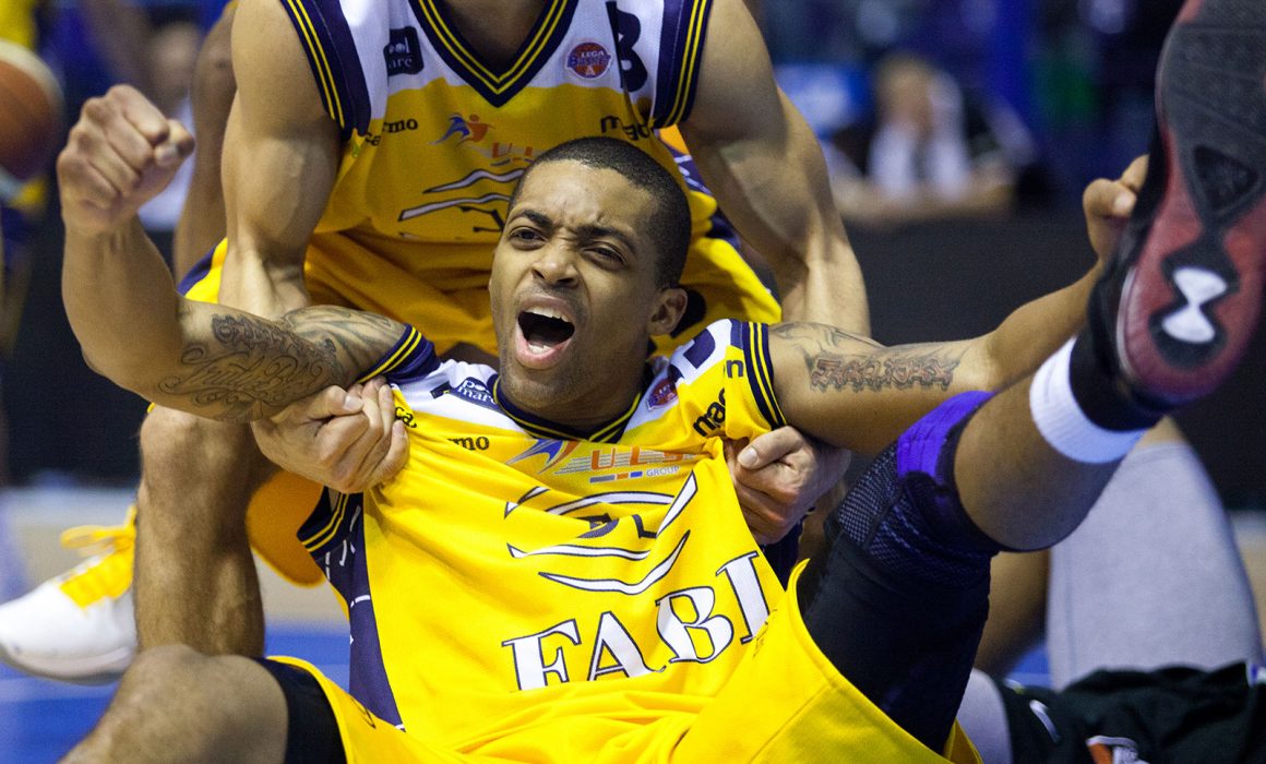 A basketball player from Sutor Montegranaro (IT) is celebrating in a match against Pepsi Caserta (IT) in Porto San Giorgio, Italy on December 18th, 2010.